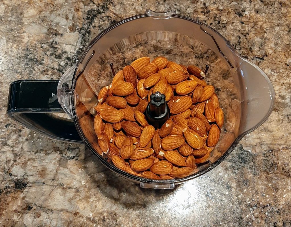 Baked almonds in food processor